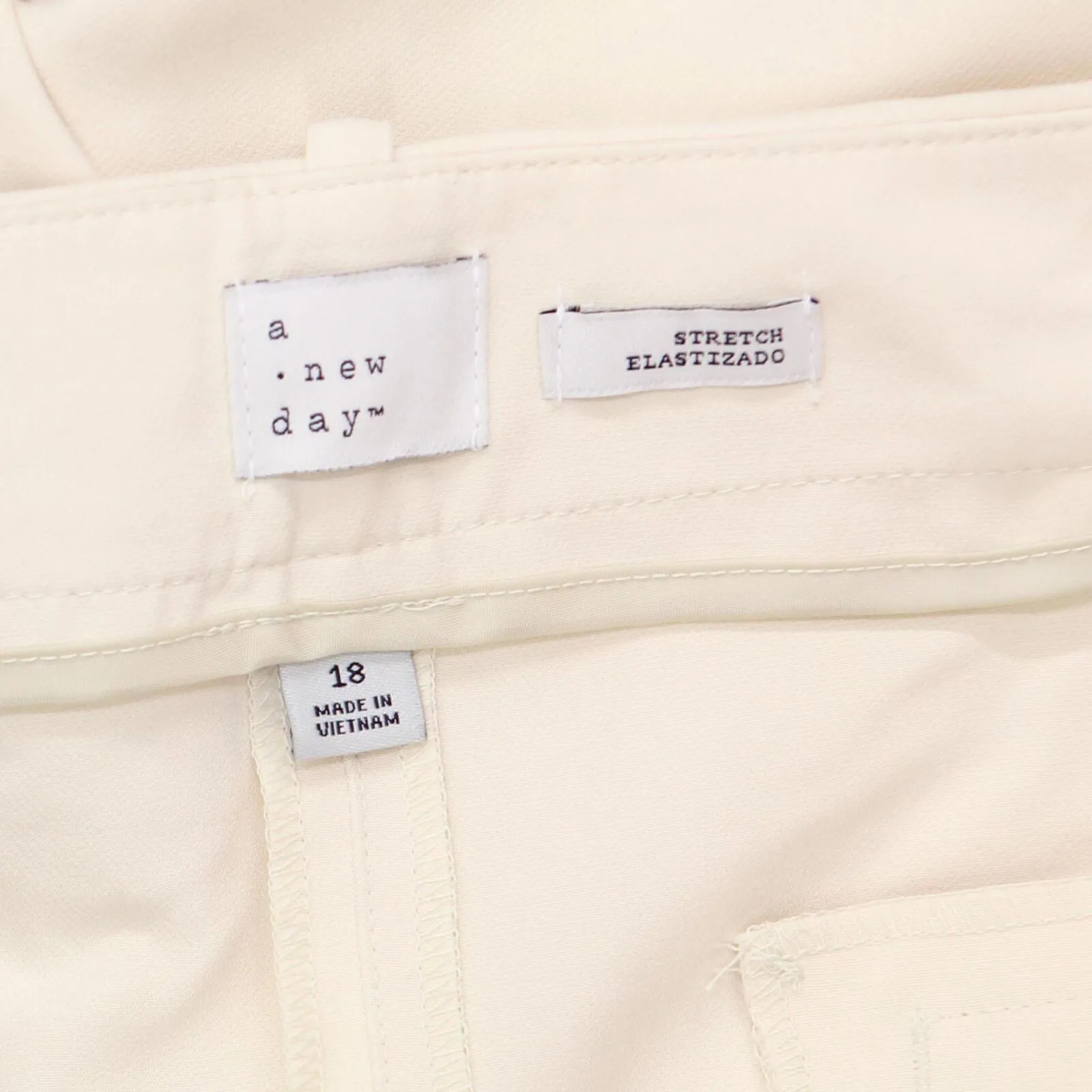 A New Day Women's Mid-Rise Regular Fit Pleated Pants. Cream Brown 18