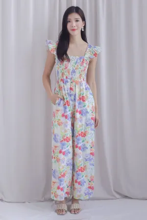 Archie Ruffle Strap Smocked Jumpsuit In Vibrant Floral
