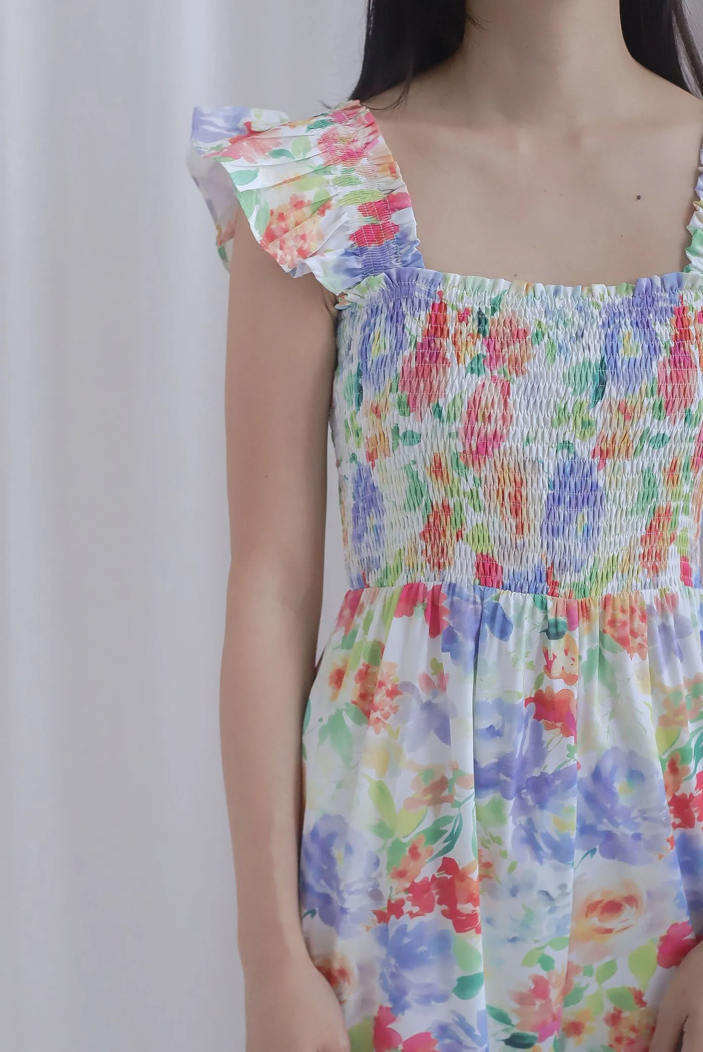 Archie Ruffle Strap Smocked Jumpsuit In Vibrant Floral