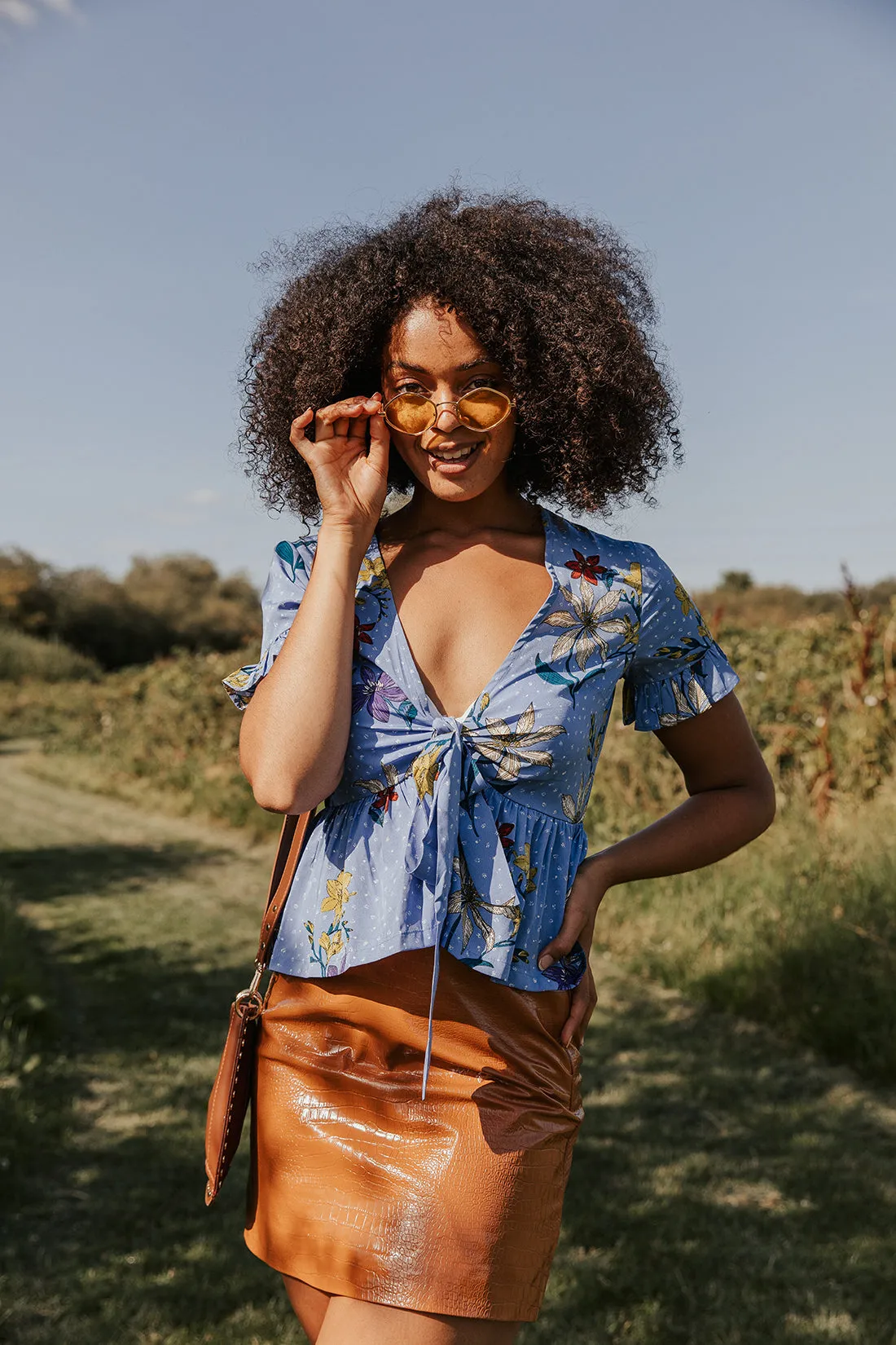 Blue Spot and Floral Frill Sleeve Tie Front Peplum Top