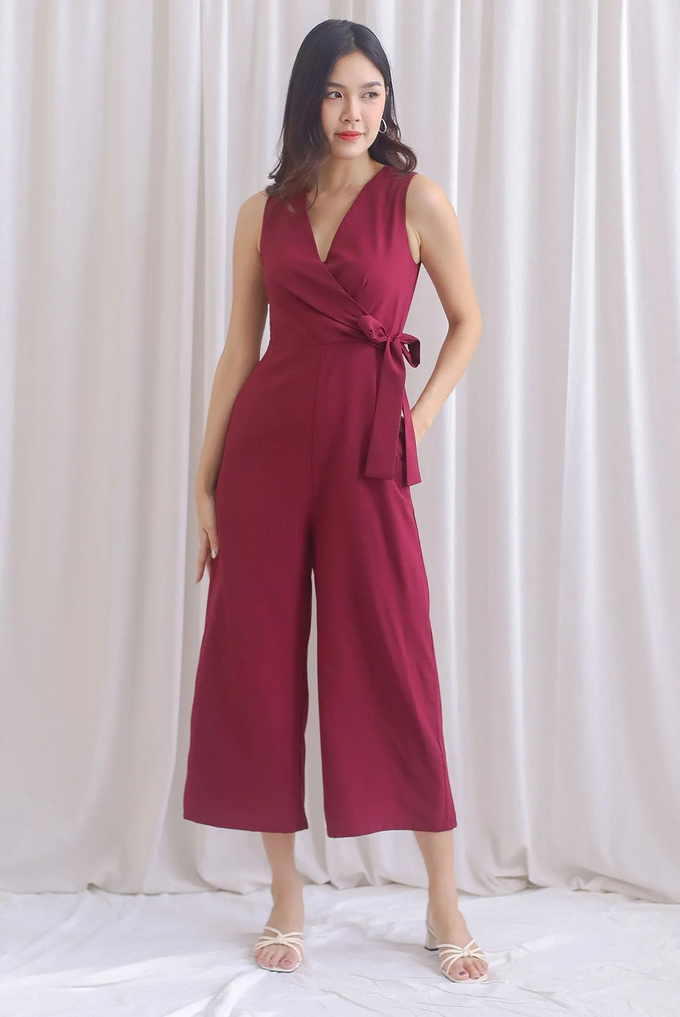 Ivy Faux Wrap Tie Jumpsuit In Wine Red