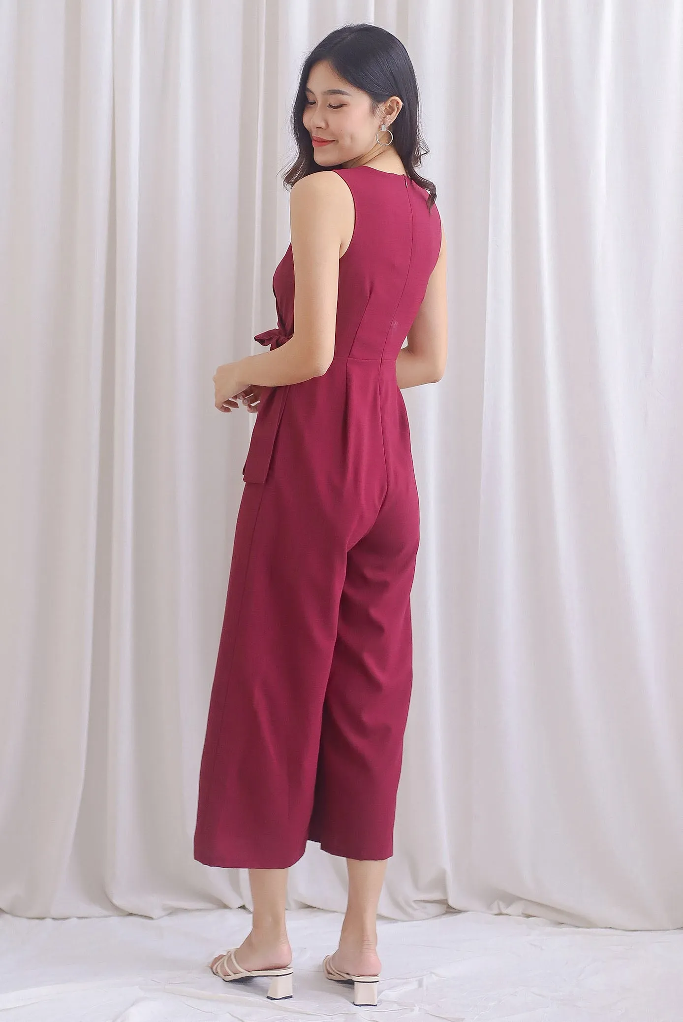 Ivy Faux Wrap Tie Jumpsuit In Wine Red