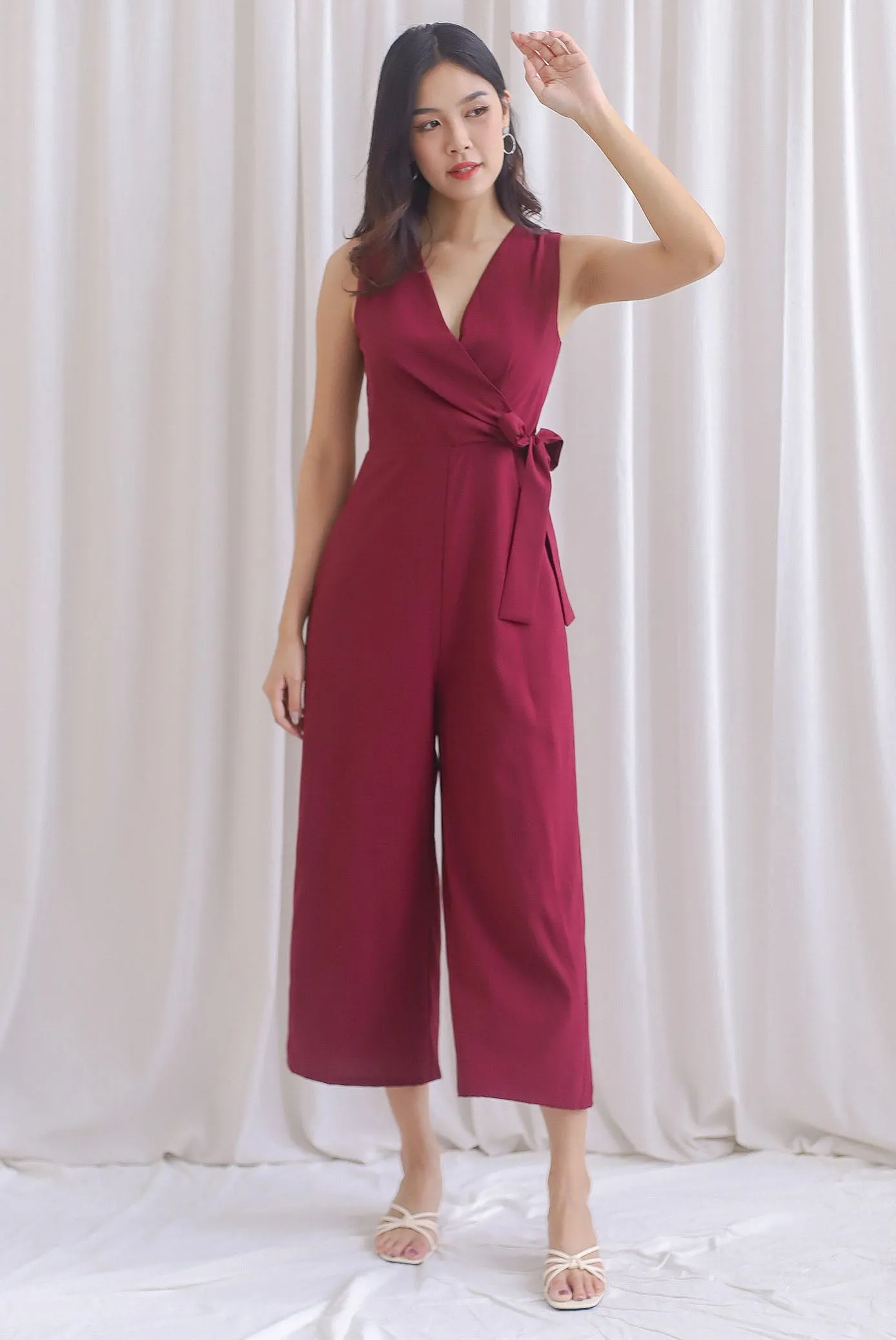 Ivy Faux Wrap Tie Jumpsuit In Wine Red