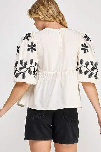 Never Forget You Puff-Sleeve Embroidered Peplum Blouse in Cream and Black