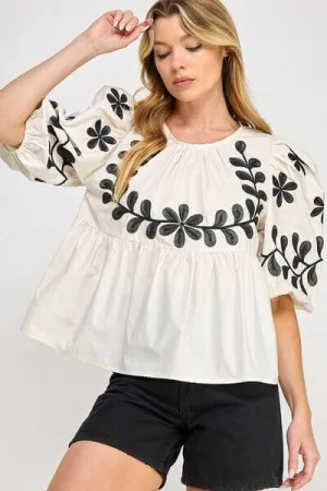 Never Forget You Puff-Sleeve Embroidered Peplum Blouse in Cream and Black