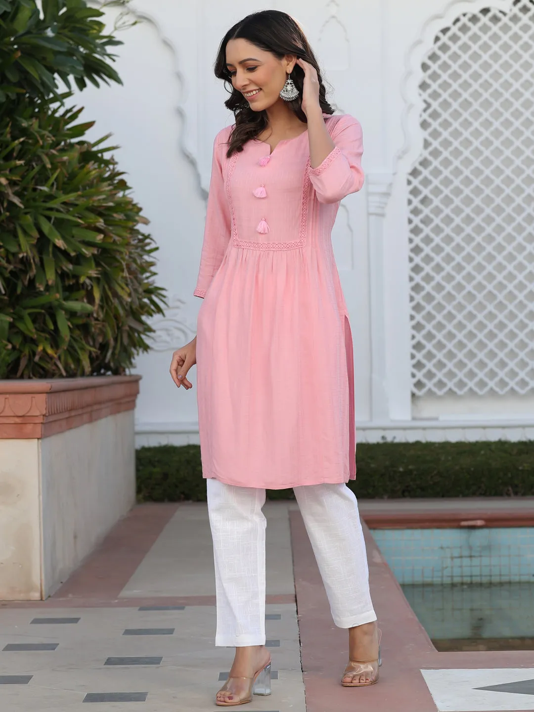 Pink Self Weave Pleated, Laced-Up And Gathered Short Kurta With Tasseles, White Cotton Straight Fit Tousers