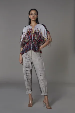 Saaksha & KinniÂ    I   Black diamond knot shirt  Rust embroidered bustier  Grey jeans Blouse - Cotton Silk  Bustier - Satin  Jeans - Denim Blouse -   Bustier - Rust  Jeans - Grey   SS22015    SS22016    SS22003