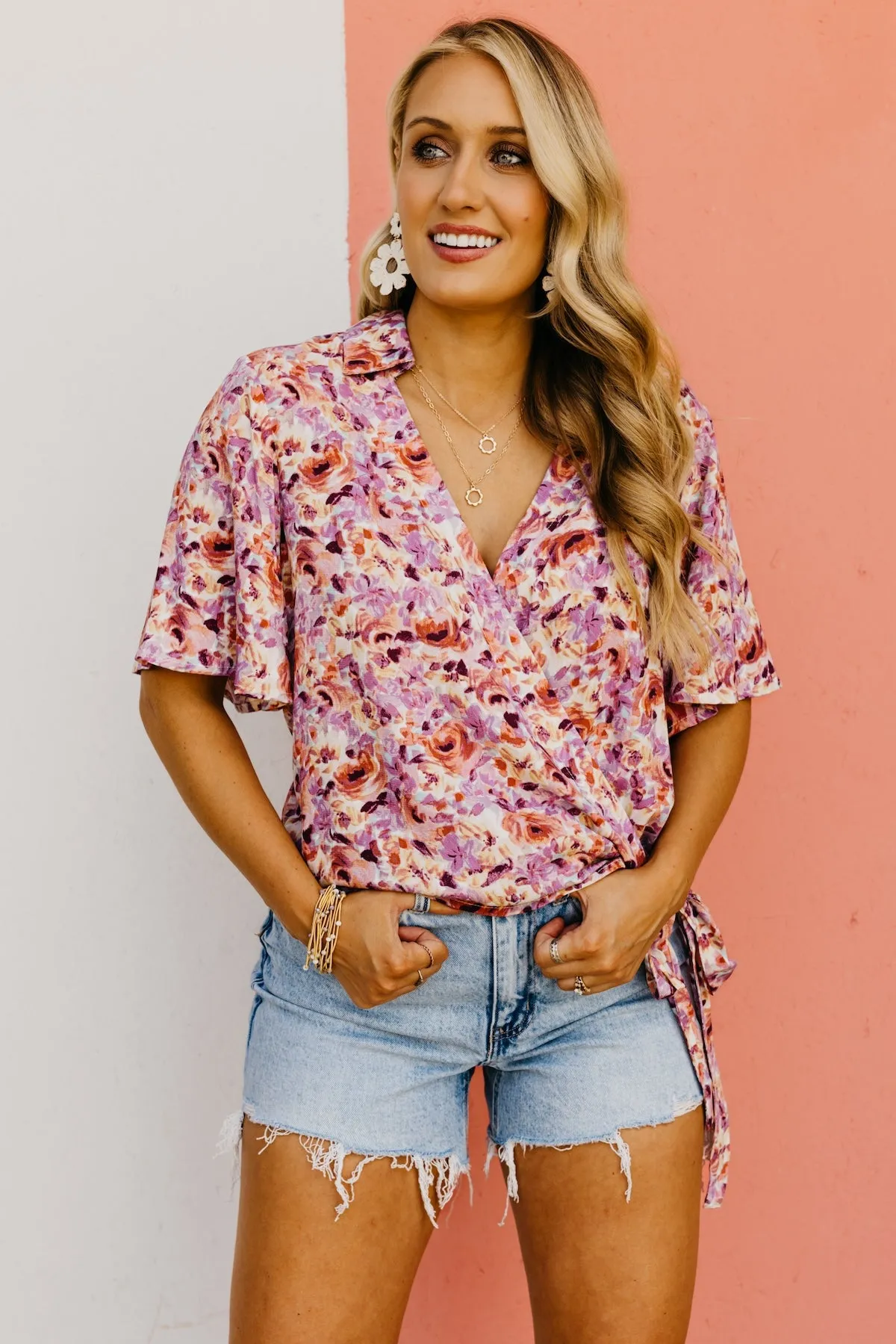 The Addisyn Floral Surplice Side Tie Blouse