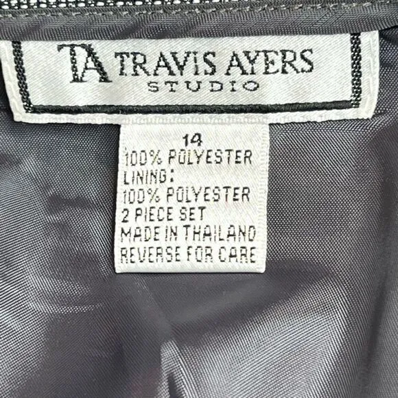 Travis Ayer’s vintage black and white textured skirt suit size 14